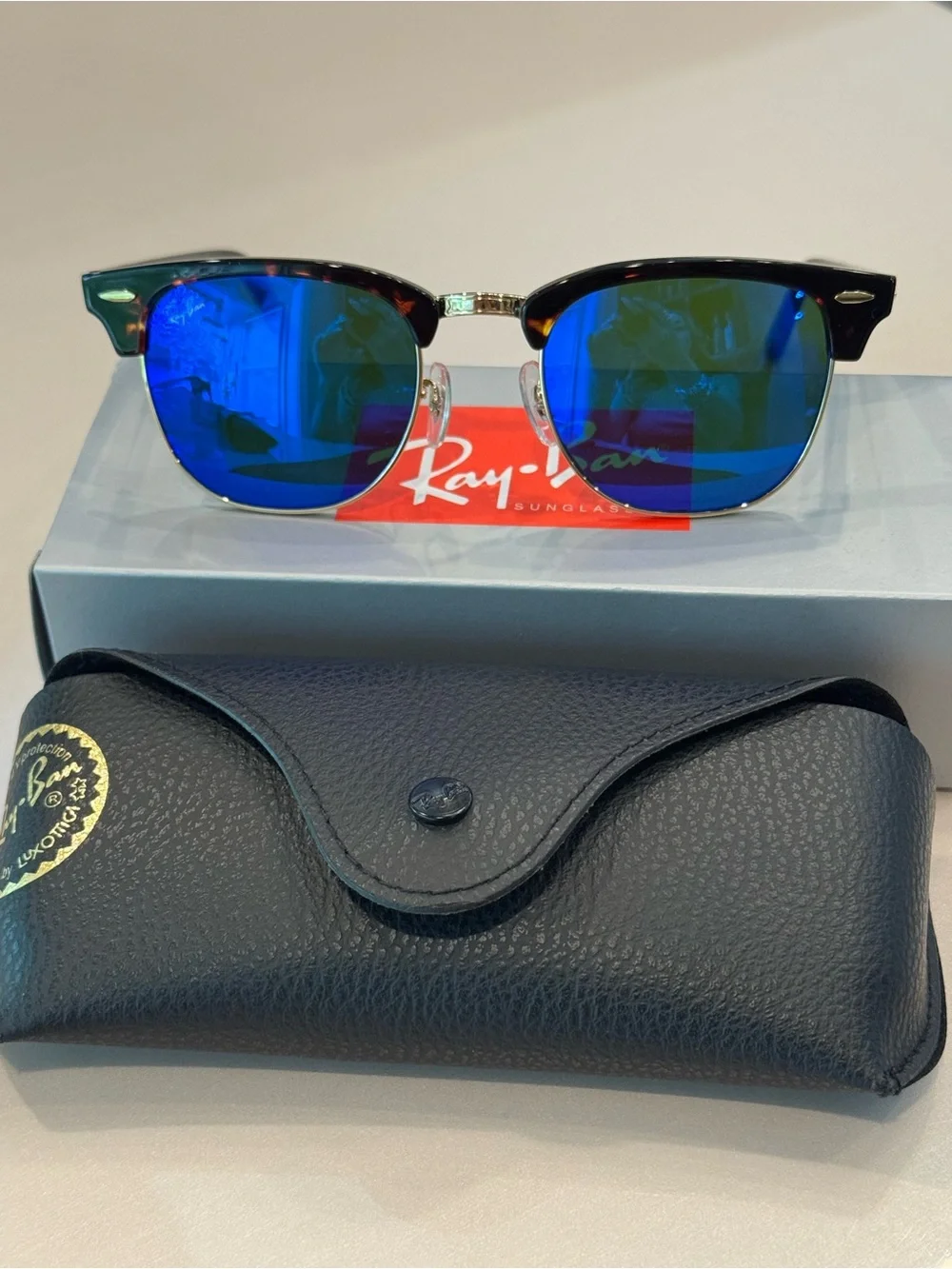 Ray-Ban Tortoiseshell Clubmaster Sunglasses with Blue Mirrored Lenses